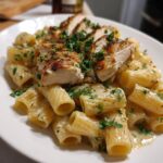creamy garlic butter chicken and rigatoni in parmesan sauce